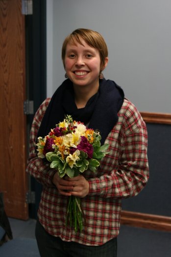 workshop participant with bouquet